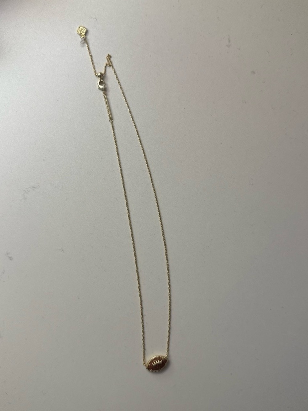 Kendra Scott Gold Football Pendant Necklace